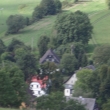 Pohled z �pat� Str�n�ho vrchu, l�to 2015, b�l� vilka - p. K�blov�, vpravo Vlkovi (d��ve �urinovi), Seseknut� st�echa - Dole�alovi